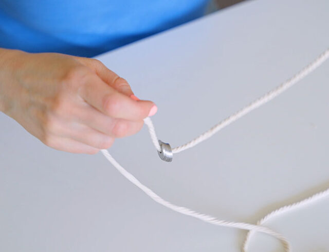 Add washers to cotton string