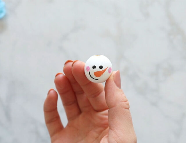Add Pink Cheek Marks with Paint Pen