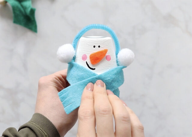 Gluing scarf onto pot