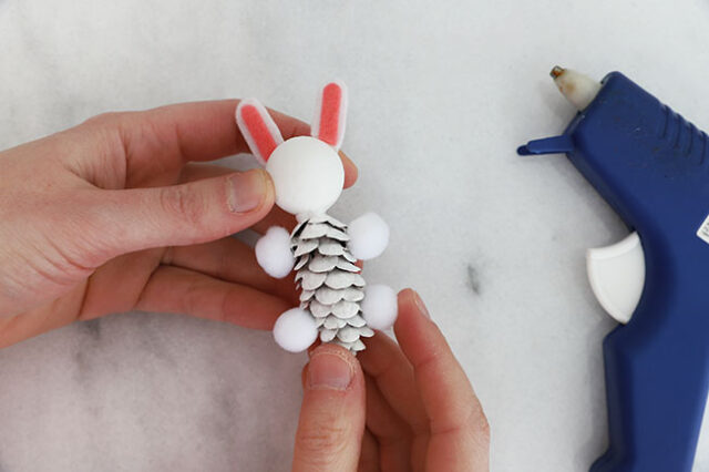 Gluing ears and arms onto body