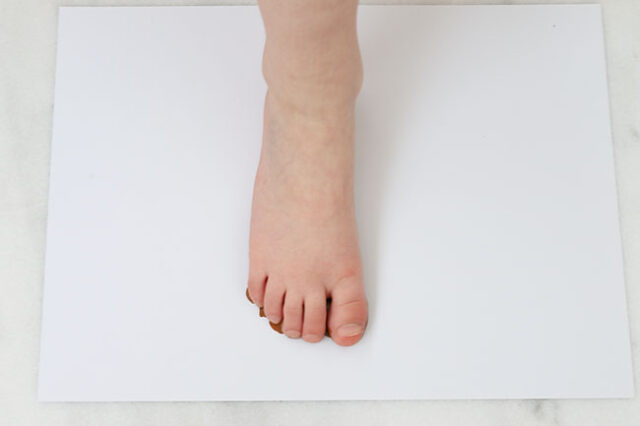 Stamping footprint onto paper