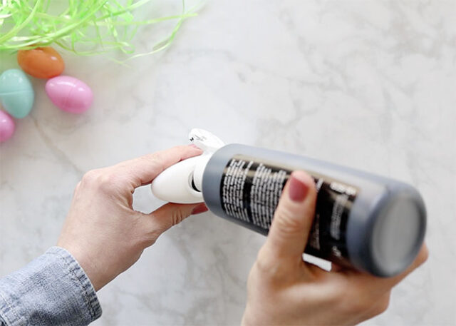 Pouring paint into glue bottle