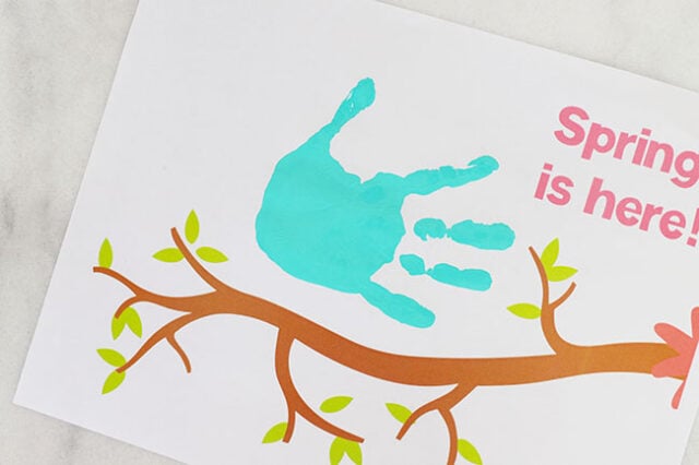 Bird handprint over branch