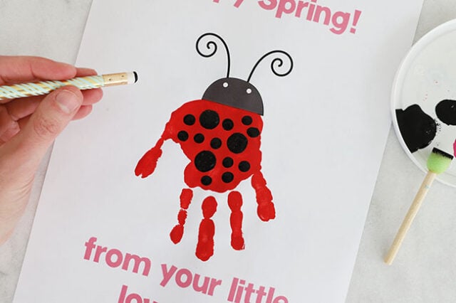 Painting dots onto ladybug body