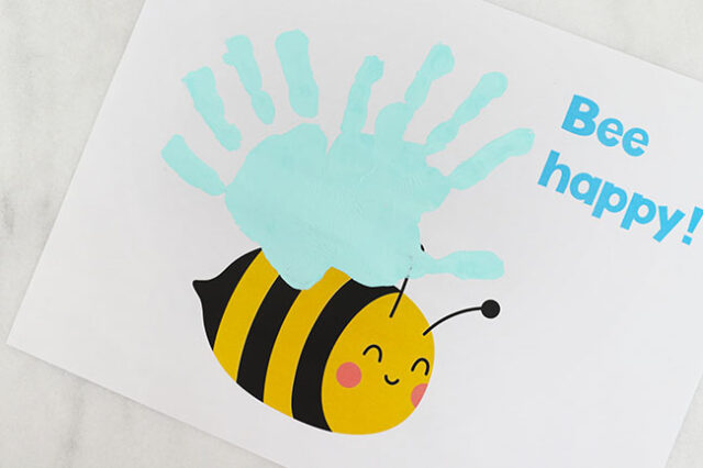 Two handprints on bee paper