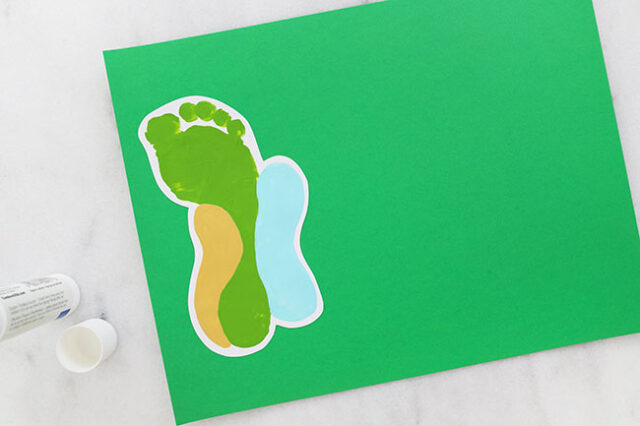 Gluing footprint onto green cardstock