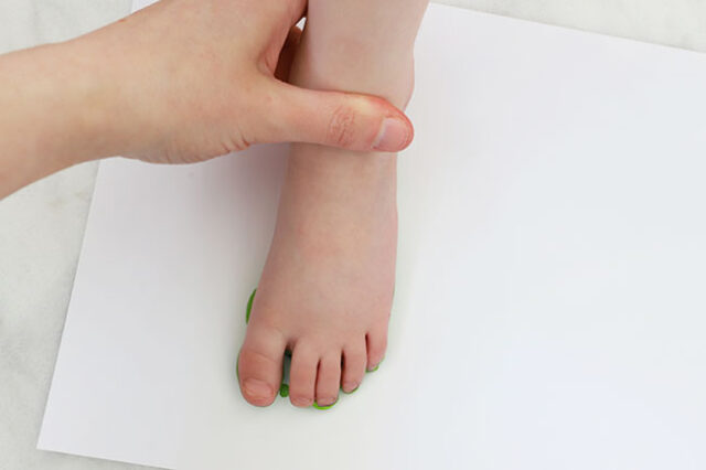 Stamping foot onto cardstock