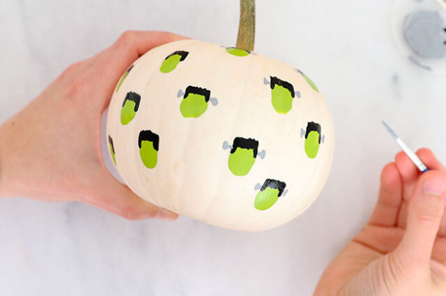 Painting bolts onto Frankenstein