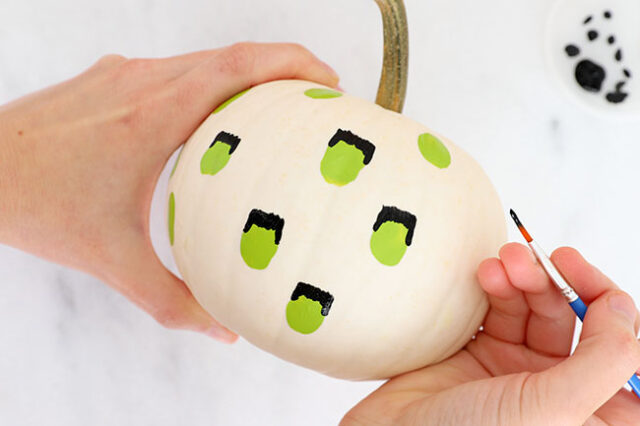 Painting hair onto Frankenstein heads