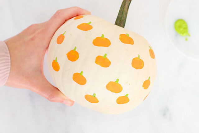Painting stems onto pumpkins