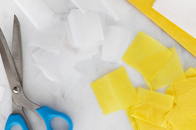 Cut out tissue paper squares