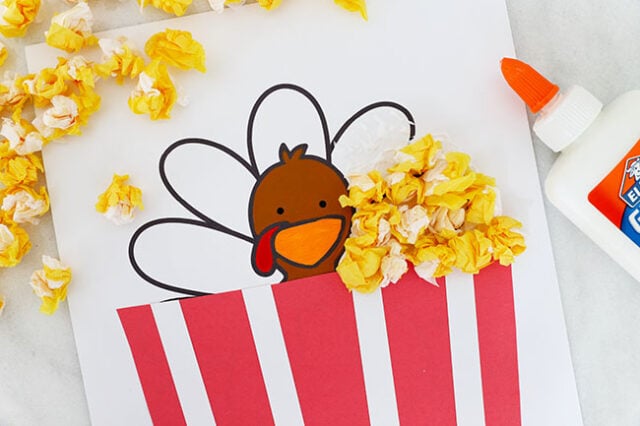 Glue down the tissue paper popcorn