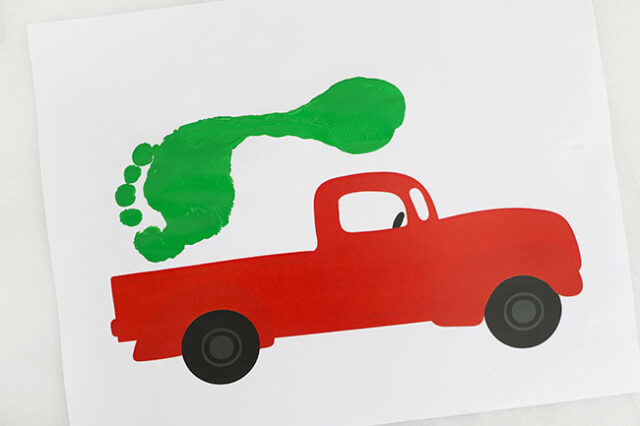 Green footprint on truck