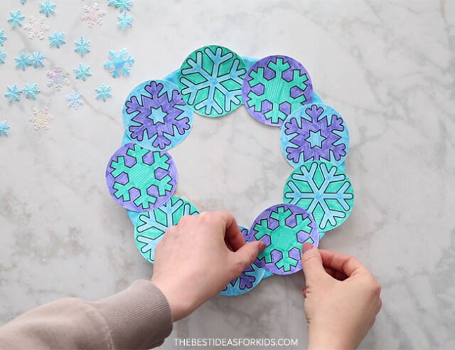 Glue Snowflakes to Paper Plate
