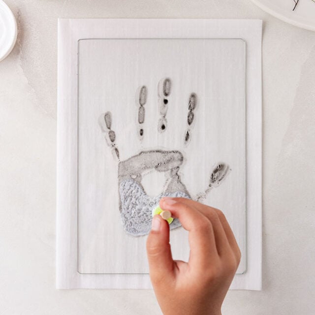 Add mod podge to handprint
