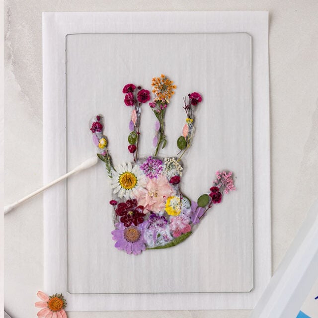 Clean up mod podge around handprint