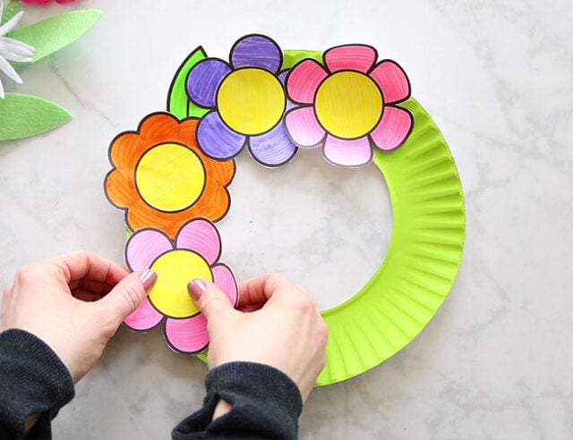 Glue Flowers to Paper Plate